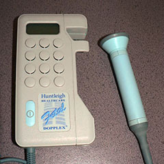 Medical instrument (fetal Doppler) used to do an ultrasound on a pregnant woman.