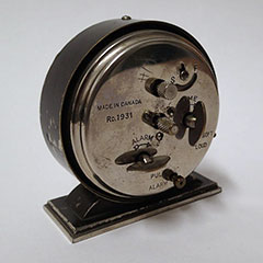 Clockwork mechanism used to set the alarm clock. Baby Ben model.